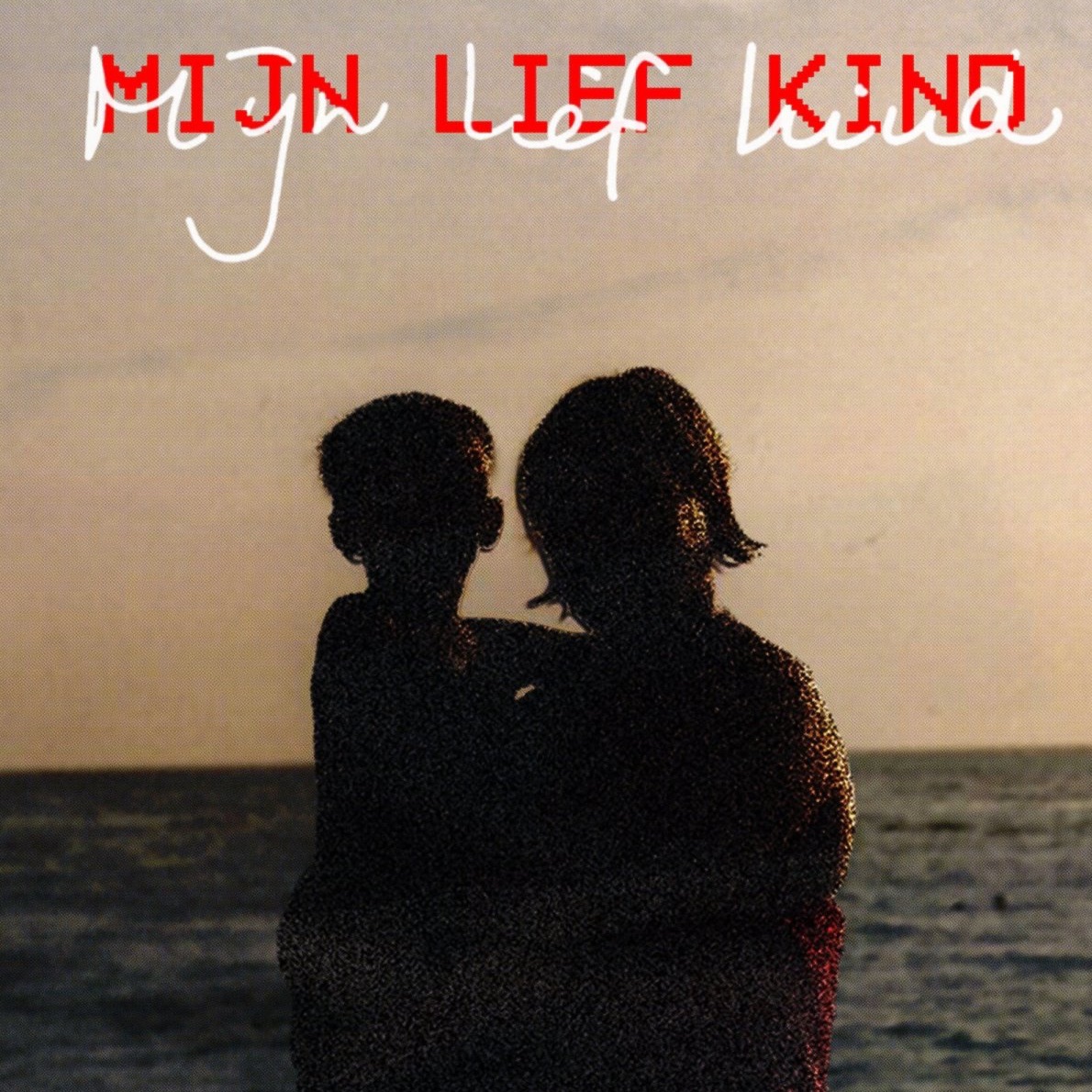 Silhouettes of two people embracing at sunset beside the sea with handwritten red typography.
