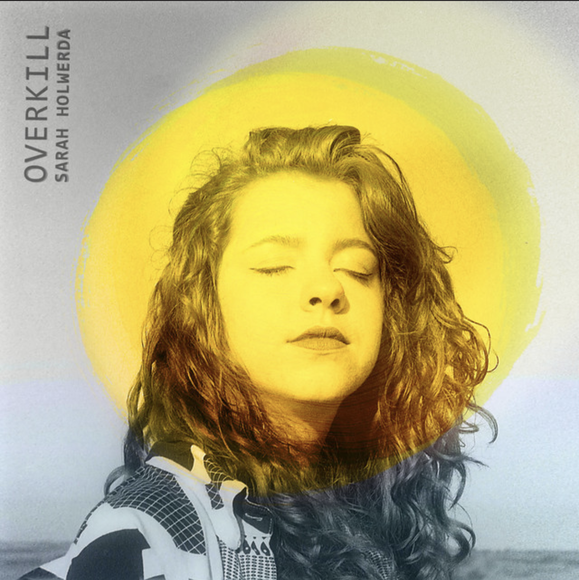 Black-and-white portrait of a young woman with closed eyes framed by a glowing yellow halo against a soft blue background.